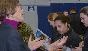 Person instructing group of students
