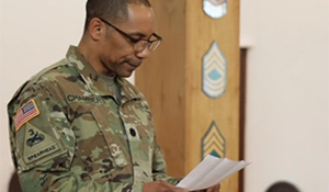 Photo of man holding certification