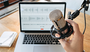 Photo of microphone and laptop
